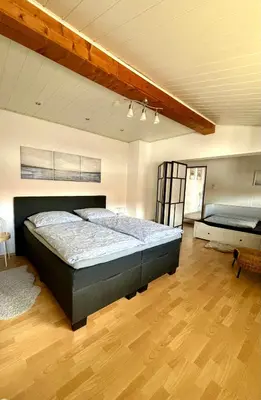 Ein Bett oder Betten in einem Zimmer der Unterkunft Gemütliche FeWo 