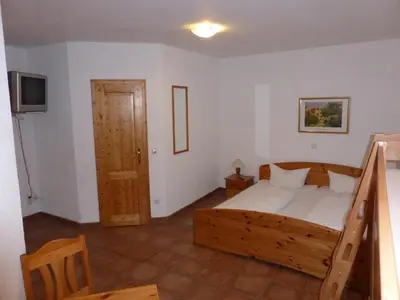 Ein Bett oder Betten in einem Zimmer der Unterkunft Zum Kaiserwirt