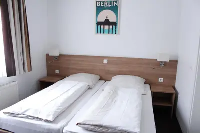 Ein Bett oder Betten in einem Zimmer der Unterkunft Pension Mavi