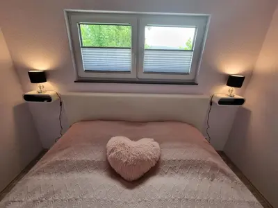 Ein Bett oder Betten in einem Zimmer der Unterkunft Ferienwohnung Los Liebos