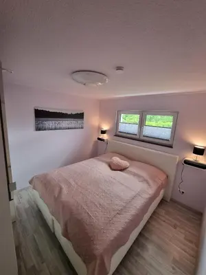 Ein Bett oder Betten in einem Zimmer der Unterkunft Ferienwohnung Los Liebos