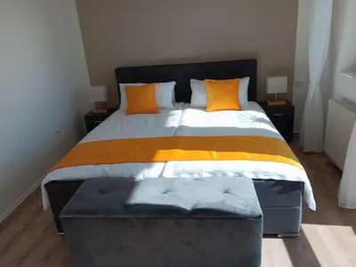 Ein Bett oder Betten in einem Zimmer der Unterkunft Gästehaus Becker