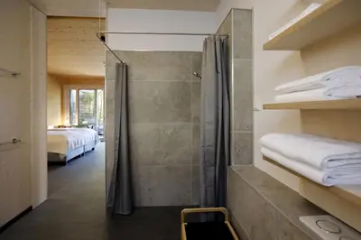 Ein Bett oder Betten in einem Zimmer der Unterkunft Barrierefreie Ferienwohnungen am Wasserturm Landau - Südpfalz