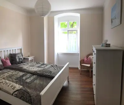 Ein Bett oder Betten in einem Zimmer der Unterkunft Altes Schulhaus Mutschelbach