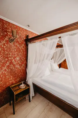 Ein Bett oder Betten in einem Zimmer der Unterkunft Altes Häusle am Waschbach