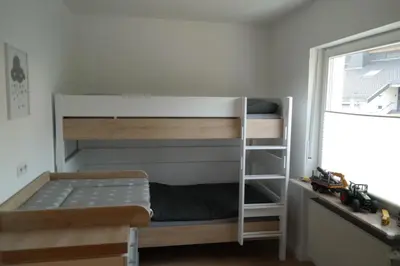 Ein Bett oder Betten in einem Zimmer der Unterkunft Ferienwohnung Schubert