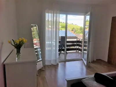 Ein Sitzbereich in der Unterkunft Ferienwohnung Sonnenberg an der Weinstraße