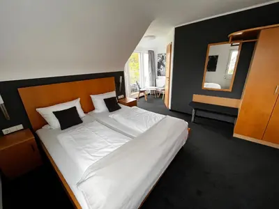 Ein Bett oder Betten in einem Zimmer der Unterkunft Landhaus Hohly