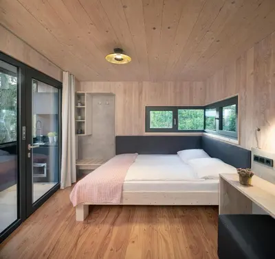 Ein Bett oder Betten in einem Zimmer der Unterkunft Baumhaus im Vogelgesang
