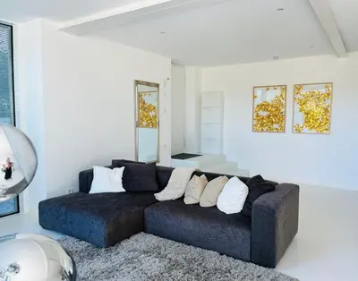 Ein Sitzbereich in der Unterkunft FeWo Silberberg im Loftstil mit Terrasse