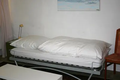 Ein Bett oder Betten in einem Zimmer der Unterkunft Herrenhof