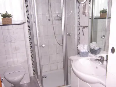 Ein Badezimmer in der Unterkunft Gästehaus Schneider