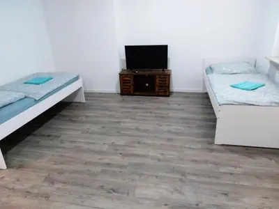 Ein Bett oder Betten in einem Zimmer der Unterkunft L8 Street-Kaiserslautern-Monteurwohnung-Worker's apartment