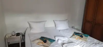 Ein Bett oder Betten in einem Zimmer der Unterkunft Hotel Bischoff Winnweiler