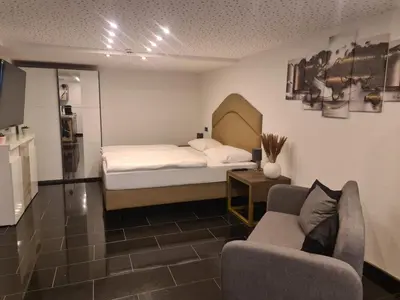 Ein Bett oder Betten in einem Zimmer der Unterkunft Appartement am Ziegeleipark