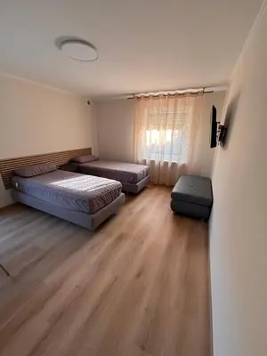 Ein Bett oder Betten in einem Zimmer der Unterkunft Ferienwohnung in Würm