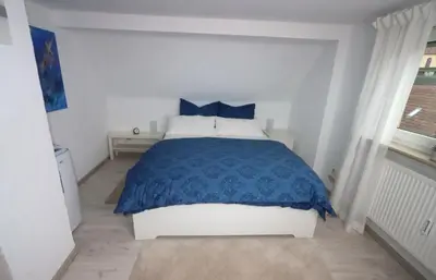 Ein Bett oder Betten in einem Zimmer der Unterkunft Fewo Odenwald - Marie