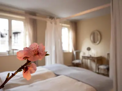 Ein Bett oder Betten in einem Zimmer der Unterkunft REFUGIUM Theresienstraße 19 - Chambre Morisot