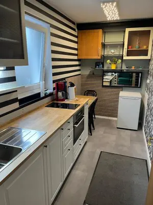 Küche/Küchenzeile in der Unterkunft Apartment Rainer mit großen Parkplätzen vorm Gebäude