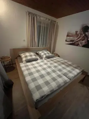 Ein Bett oder Betten in einem Zimmer der Unterkunft Ferienwohnung in Dahn