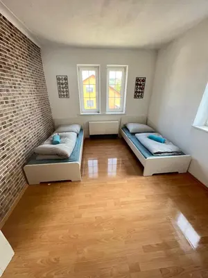 Ein Bett oder Betten in einem Zimmer der Unterkunft Promotion Prices Monteurwohnung nahe Pforzheim und Karlsruhe