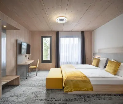 Ein Bett oder Betten in einem Zimmer der Unterkunft Ferienwohnung im Vogelgesang W3