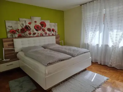 Ein Bett oder Betten in einem Zimmer der Unterkunft Ferienwohnung Mohnblume