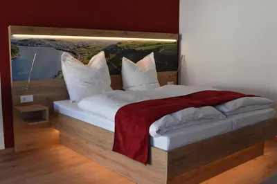 Ein Bett oder Betten in einem Zimmer der Unterkunft Weingut Lindenhof Kröhler