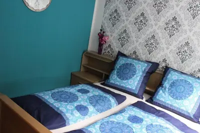 Ein Bett oder Betten in einem Zimmer der Unterkunft Ferienwohnung DaWie