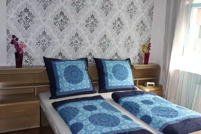 Ein Bett oder Betten in einem Zimmer der Unterkunft Ferienwohnung DaWie