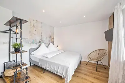 Ein Bett oder Betten in einem Zimmer der Unterkunft Ruhiges und zentrales Apartment in Hüttenfeld