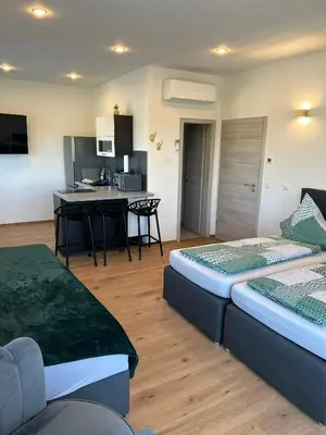 Ein Bett oder Betten in einem Zimmer der Unterkunft Apartment Im Sand nahe am See