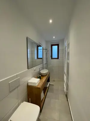 Ein Badezimmer in der Unterkunft Ferienwohnungen Pfaffenhof