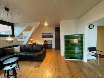 Ein Sitzbereich in der Unterkunft Ferienwohnungen Pfaffenhof