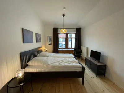 Ein Bett oder Betten in einem Zimmer der Unterkunft Ferienwohnungen Pfaffenhof