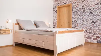 Ein Bett oder Betten in einem Zimmer der Unterkunft PfalzZeit