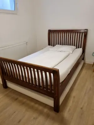 Ein Bett oder Betten in einem Zimmer der Unterkunft Business Apartment