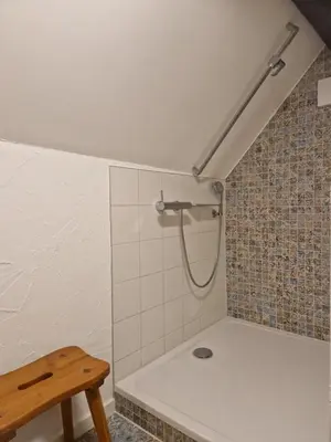 Ein Badezimmer in der Unterkunft Brunnenputzer Pension Restaurant