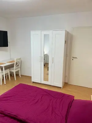 Ein Bett oder Betten in einem Zimmer der Unterkunft Zimmer im Herzen von Durlach