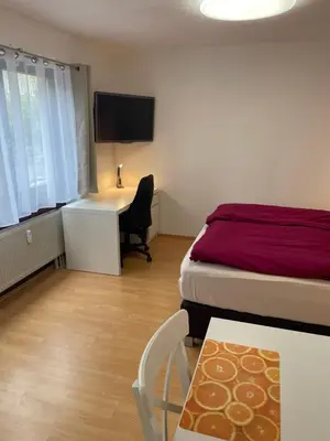 Ein Bett oder Betten in einem Zimmer der Unterkunft Zimmer im Herzen von Durlach