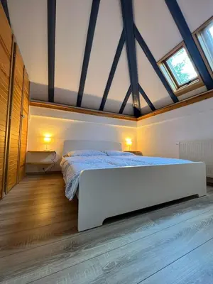 Ein Bett oder Betten in einem Zimmer der Unterkunft Ferienhaus Odenwald