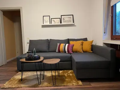Ein Sitzbereich in der Unterkunft Ferienwohnung auf dem Betzenberg