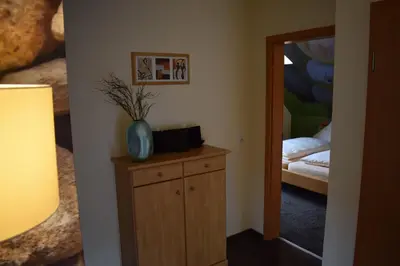 Ein Bett oder Betten in einem Zimmer der Unterkunft Ferienhaus & Weingut am Steingebiss