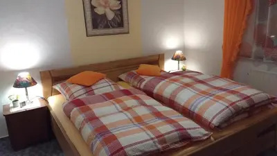 Ein Bett oder Betten in einem Zimmer der Unterkunft Antjes Ferienwohnung Flonheim