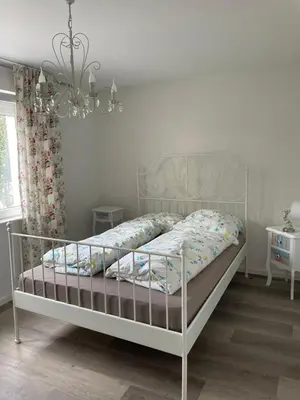 Ein Bett oder Betten in einem Zimmer der Unterkunft Ferienwohnung Rotenfels