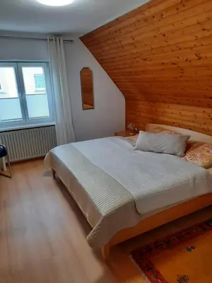 Ein Bett oder Betten in einem Zimmer der Unterkunft Neugärten