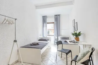 Ein Bett oder Betten in einem Zimmer der Unterkunft Chic 4 Room Apartment in Mannheim