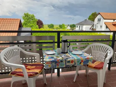 Ein Balkon oder eine Terrasse in der Unterkunft Ferienwohnung am Schoosberg, Niederkirchen bei Deidesheim