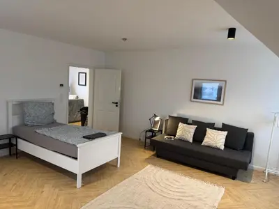 Ein Bett oder Betten in einem Zimmer der Unterkunft Ferienunterkunft Lutherbaum 4 Zimmer