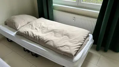 Ein Bett oder Betten in einem Zimmer der Unterkunft Apartment centrally located in the Rhine-Main area